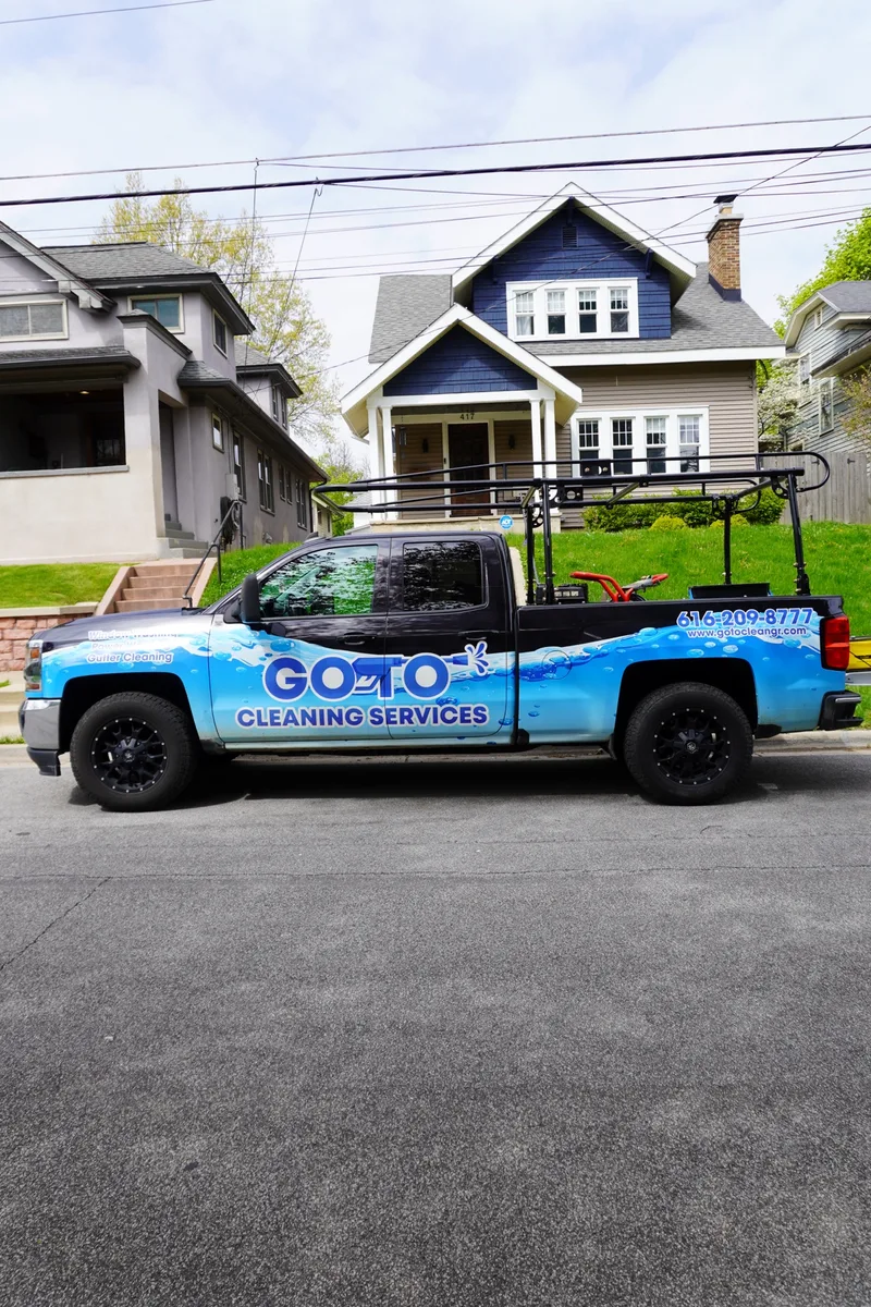 Go To Cleaning Services truck parked at a Grand Rapids home