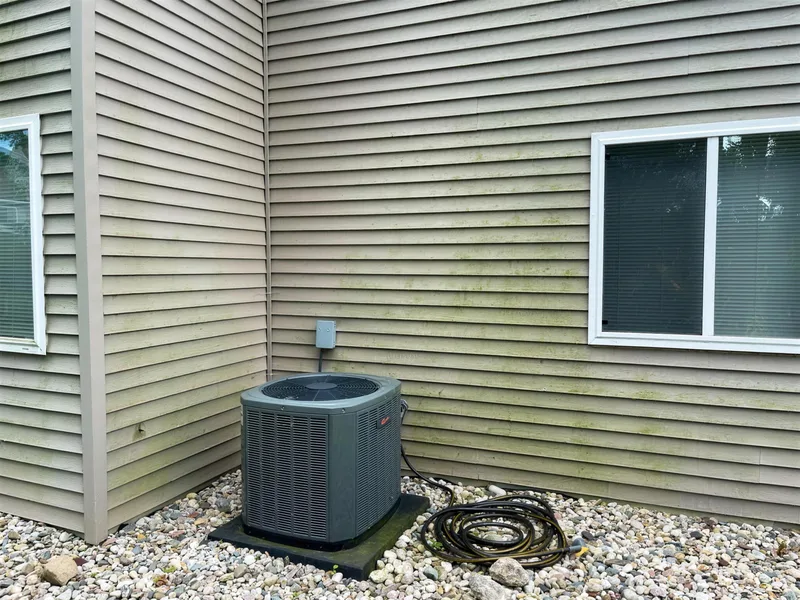 After: the same Zeeland home siding clean after a house wash