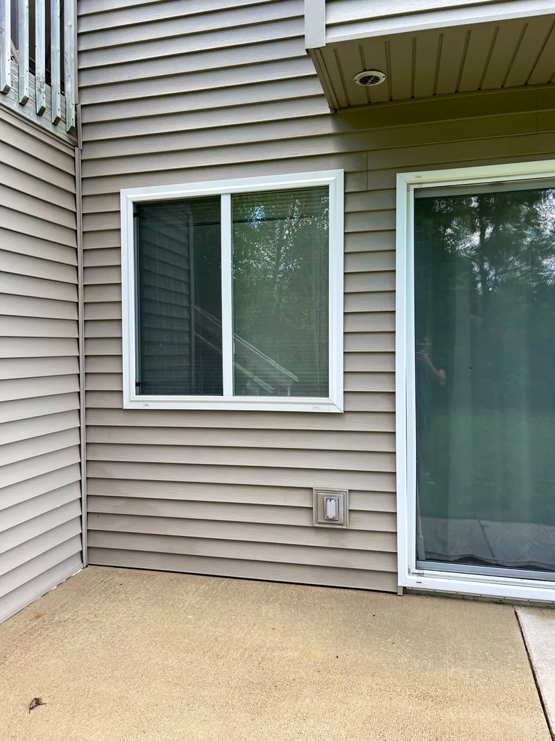 Siding, window and patio clean after a house wash in Zeeland