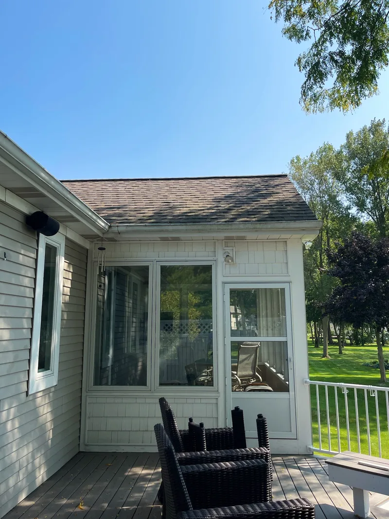 Spotless sunroom windows on a Rockford-area home